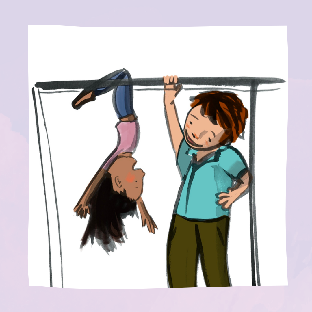 Laura, a girl in a pink t-shirt with light brown skin and long dark hair hangs from some monkey bars. An adult with pale skin and orange hair, smiling, holds the monkey bars with one hand on their hip
